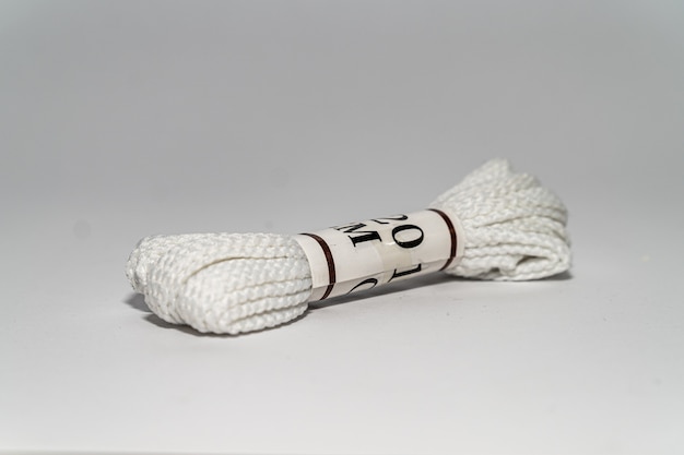 White cord rope isolated on a white surface