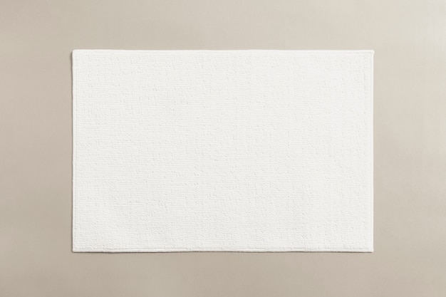 White cotton bathroom mat on the floor