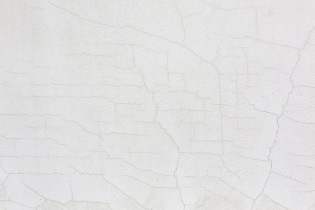 White cracked wall stucco texture background