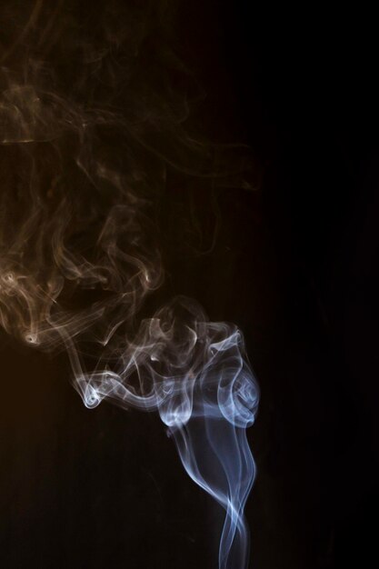 White creative smoke on black background