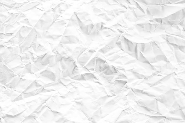 White crumpled space paper textured background
