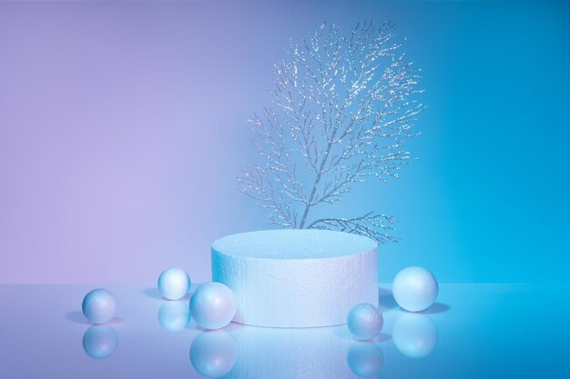 White cylindrical podium on bluepink gradient background christmas decor