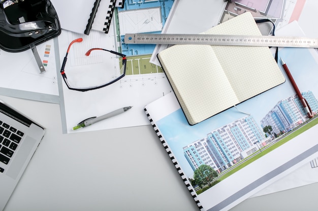 "White desk with office stationery "