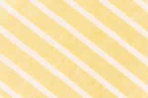Foto gratuita linea diagonale bianca su tessuto giallo