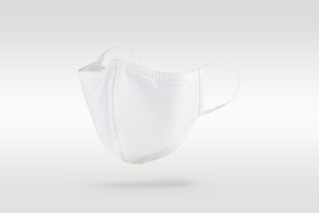 White fabric face mask on off white