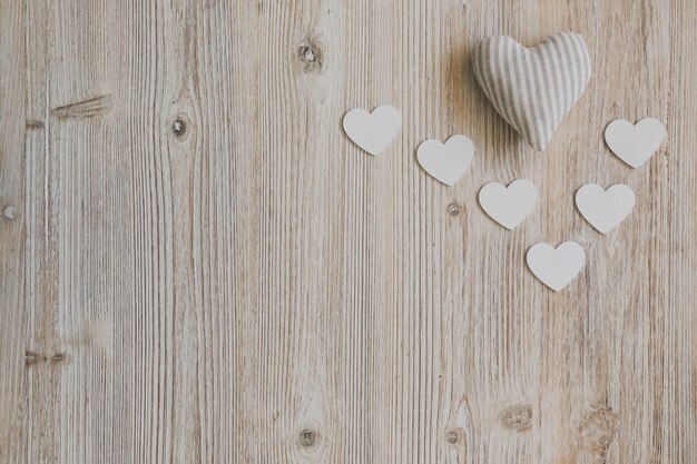 White fabric heart with white hearts underneath