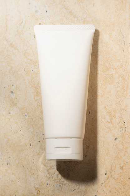 White face cream tube, unlabeled beauty product