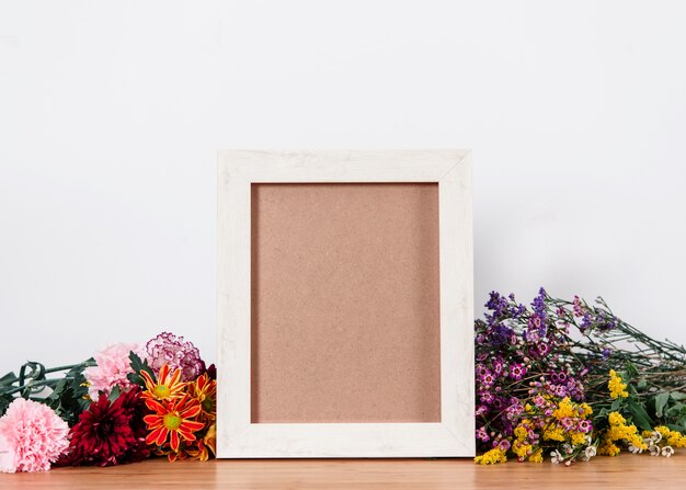 White frame and colorful flowers