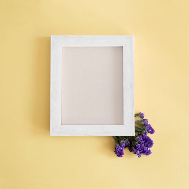 White frame and purple flowers
