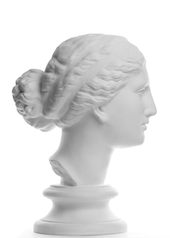 白い​背景​に​分離された​芸術家​の​ため​の​ミロ​の​ヴィーナス​の​古代像​の​白い​石膏​コピー​。​女性​の​顔​の​石膏​彫刻​。
