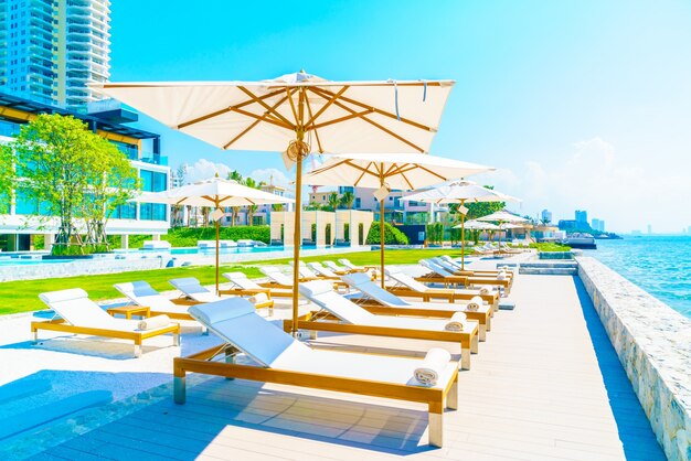 White hammocks with umbrellas