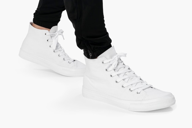 White high-top sneaker on white background