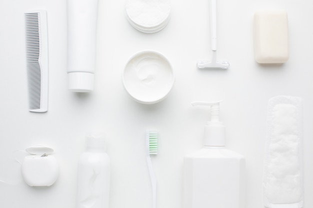 White hygiene products arrangement flat lay