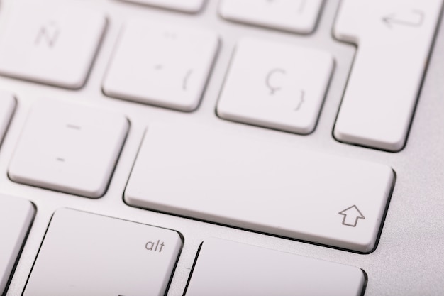 White keyboard of modern laptop