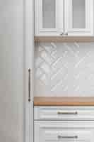 Free photo white kitchen furniture close-up