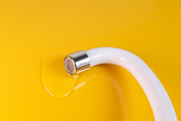 White kitchen sink faucet  - Close up