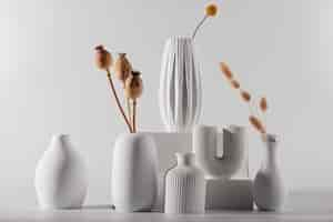 Free photo white modern vases arrangement