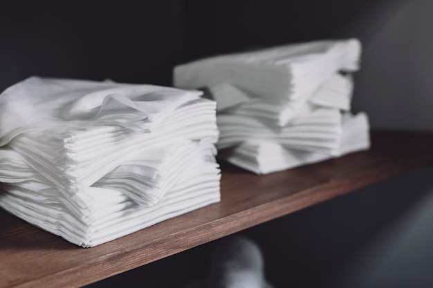 Free photo white napkins on shelf