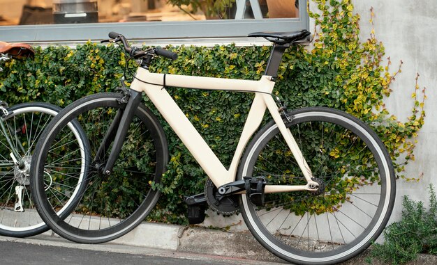 White old bicycle with black wheels