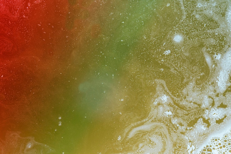 Free Photo white paint on colorful water