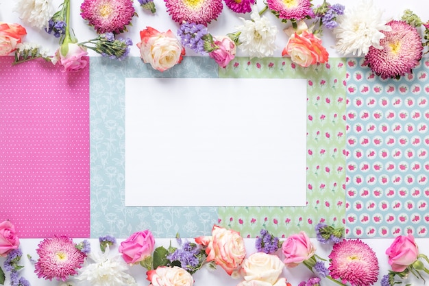 White paper on decorative background with flowers