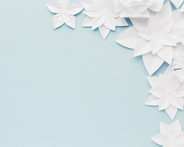 White paper flowers on table