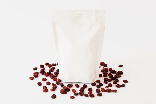 White paper package with liquid between dried fruits