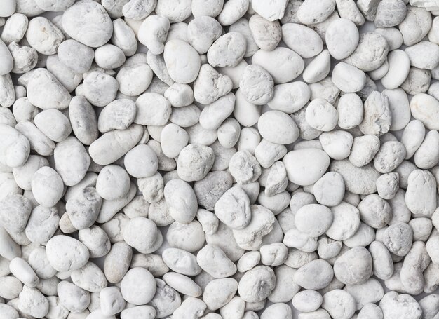 Premium Photo | White pebbles stone texture and background