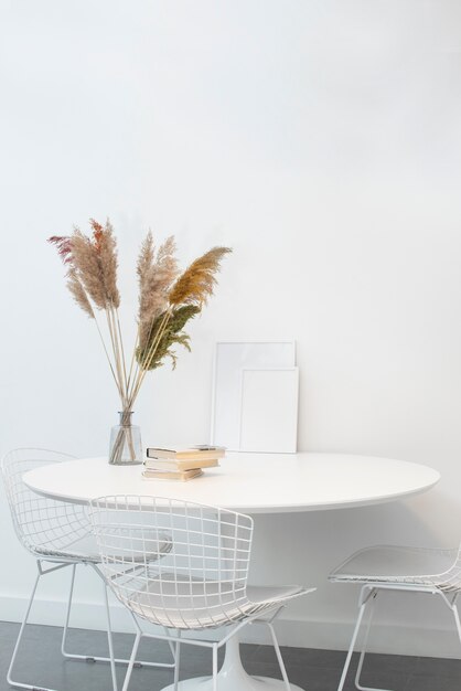 White photo frames on table interior design