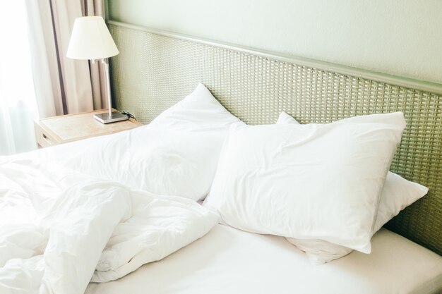 White pillow on bed