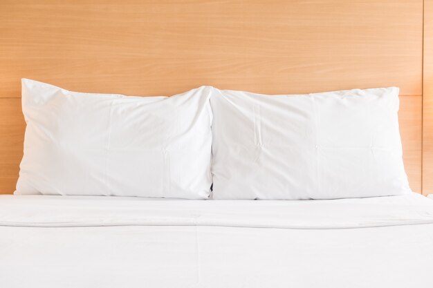 White pillow on bed