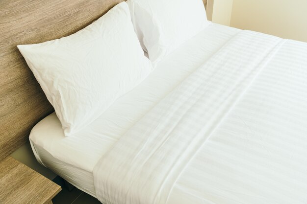 White pillow on bed
