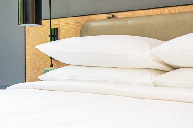 White pillow and blanket on bed decoration interior of bedroom