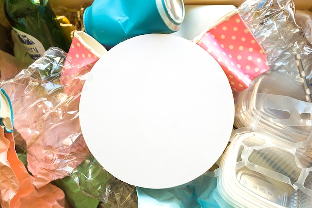 White plate in trash pile