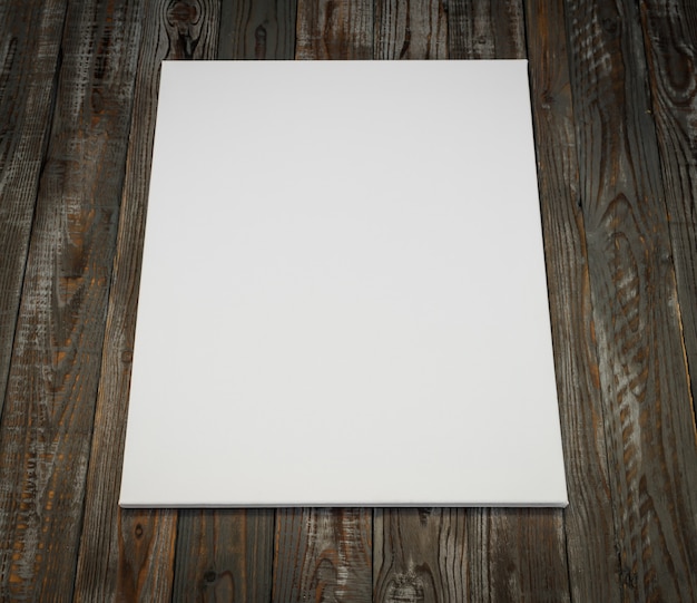 White poster on a wooden background