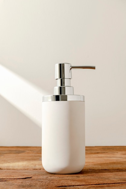 White pump soap bottle on a table