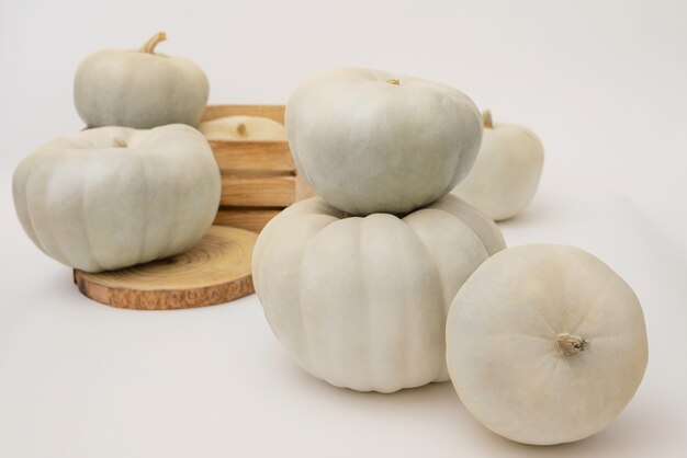 White pumpkins and box