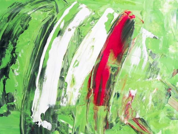 White and red strokes on green background