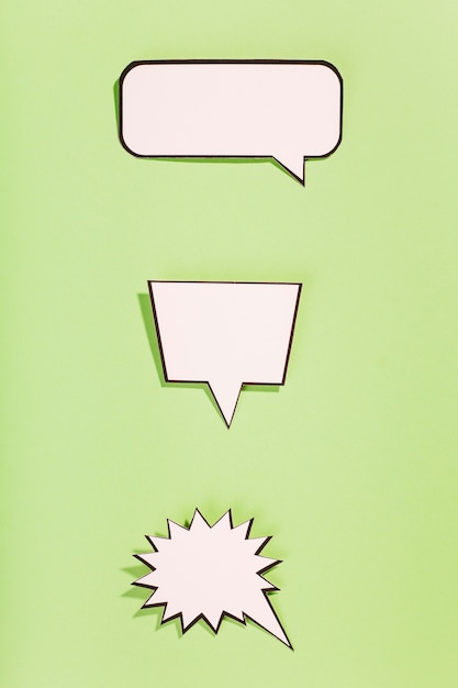 Free photo white retro comic empty speech bubbles