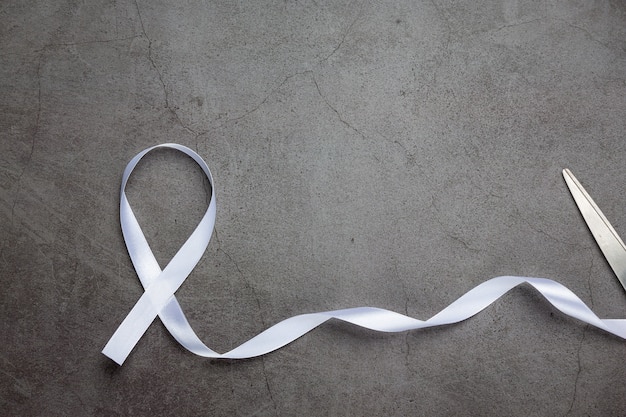 Free photo white ribbon symbol of peace international day of non violence.