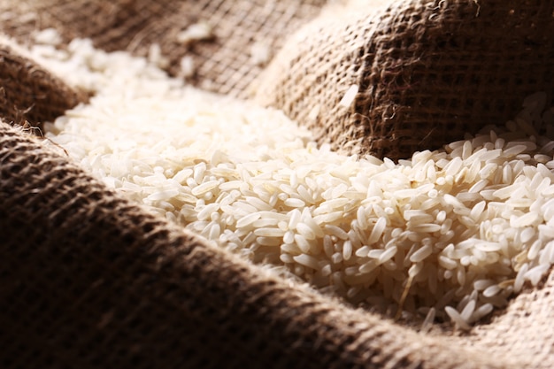 White rice grains on sack cloth