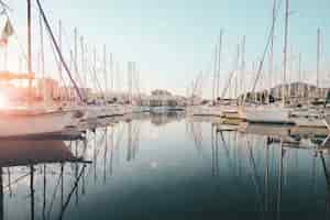 Free photo white sailboat in body of water during daytime