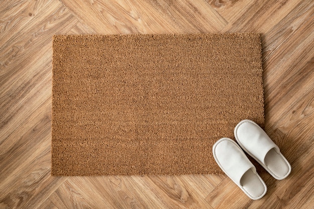 White slippers on a doormat