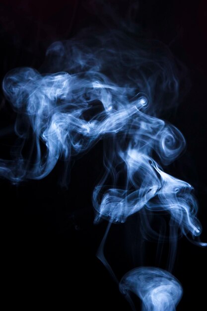 White smoke abstract waves on black background