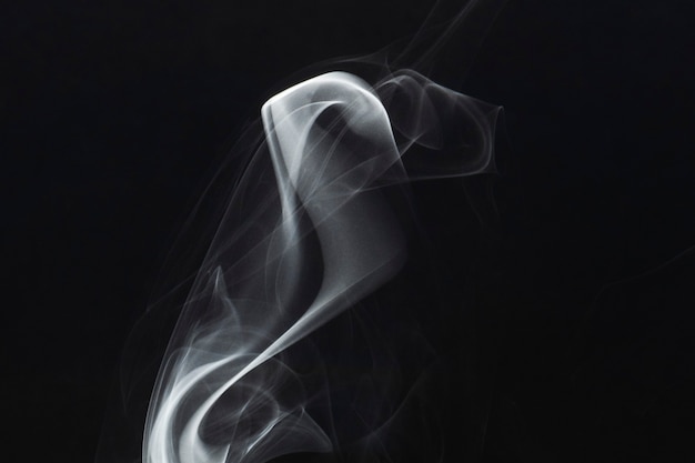 White smoke on dark background