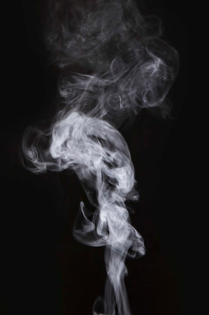 White smoke movement on black background