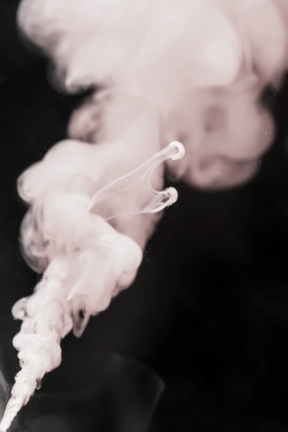 White smoke with black background