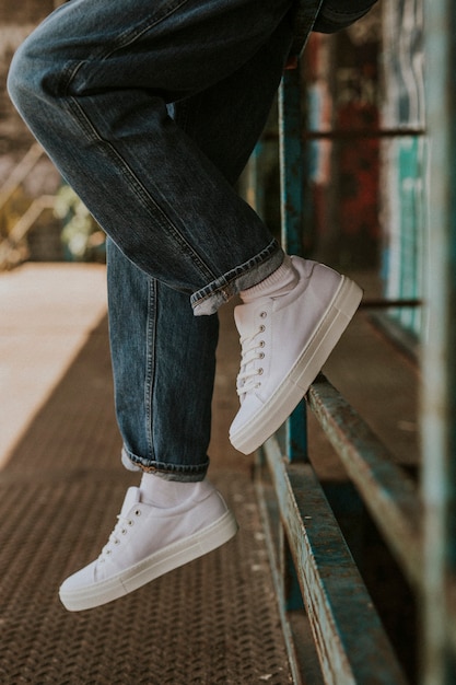 White sneakers on woman model