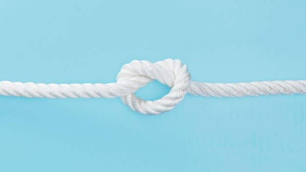 White solid rope with a knot
