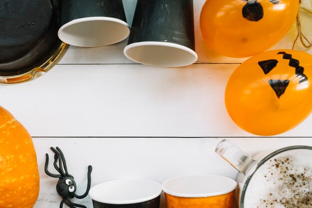 White space surrounded by Halloween pumpkin and pictured balloons